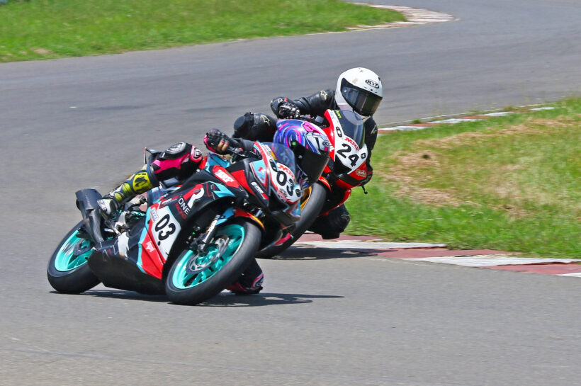 Jagathishree Kumaresan (3) holding off Ann Jennifer (24) on way to winning the Girls (Stock 165cc) race (Sept 6)