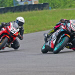 Jagathishree Kumaresan (3) holding off Ann Jennifer (24) on way to winning the Girls (Stock 165cc) race (Sept 7)
