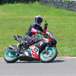 Jagathishree Kumaresan celebrating her victory in the Girls (Stock 165cc) race (Oct 4)