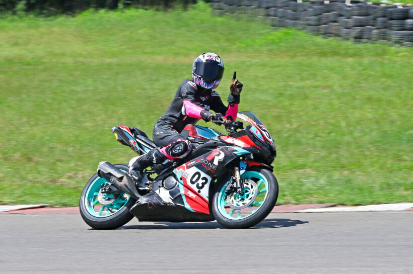 Jagathishree Kumaresan celebrating her victory in the Girls (Stock 165cc) race (Oct 4)