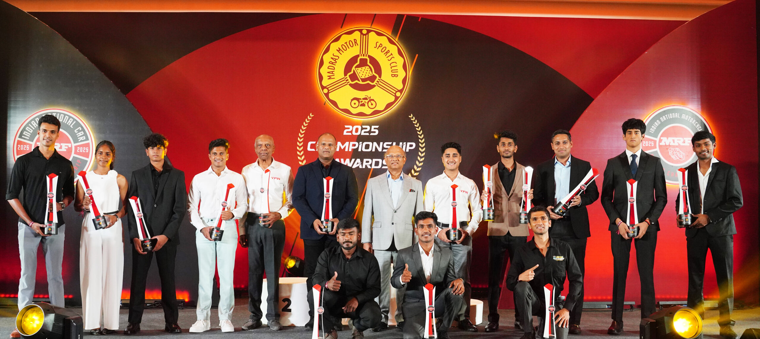 The MRF MMSC FMSCI National four-wheeler and two-wheeler champions along with MRF Vice-Chairman and Managing Director Arun Mammen (7th from left) (March 12)